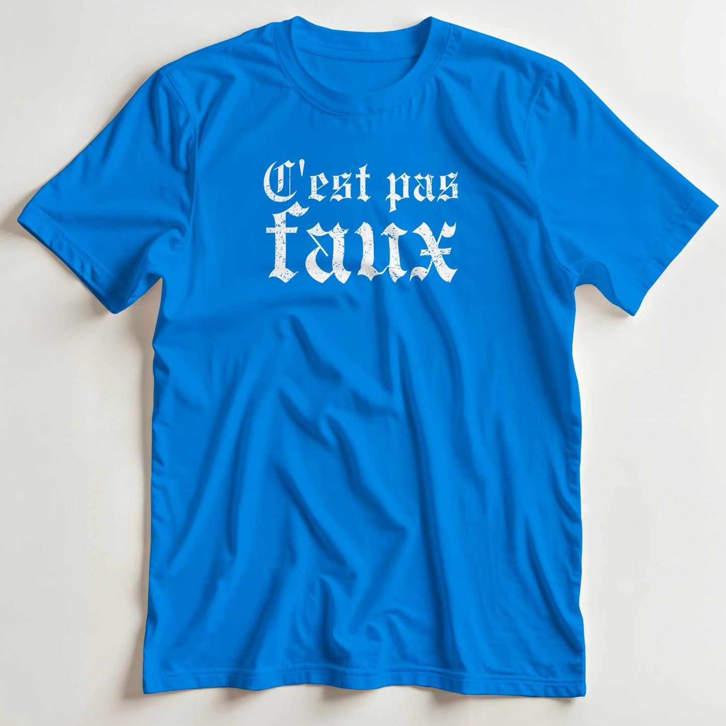 T-shirt en coupe unisexe et 100% coton en Royal M imprimé avec un design C'est Pas Faux T-Shirt .
