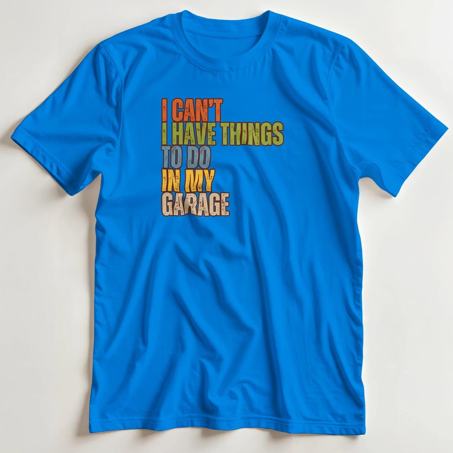 T-shirt en coupe unisexe et 100% coton en Royal XL imprimé avec un design I Can't My Garage T-Shirt .