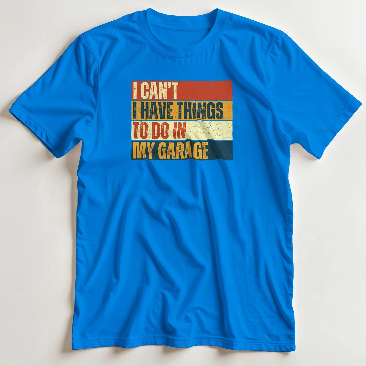 T-shirt en coupe unisexe et 100% coton en Royal S imprimé avec un design I Can't Garage Vintage T-Shirt .